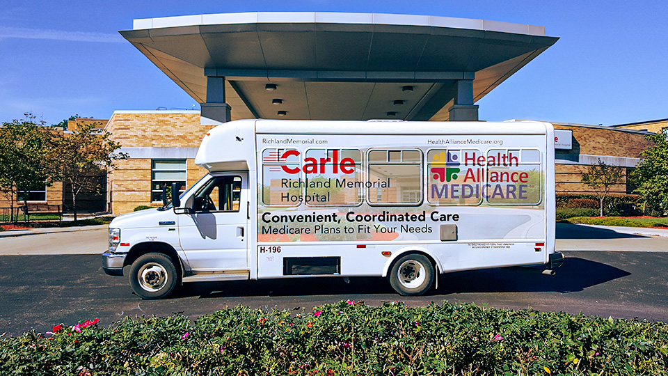 Example of a full-color advertisement on the side of a transit bus.